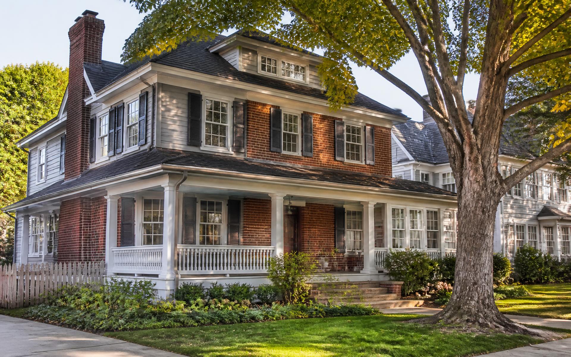 A brick colonial home on a tree-lined street in Northeast Ohio